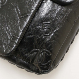 Sac CHANEL cuir embossé noir